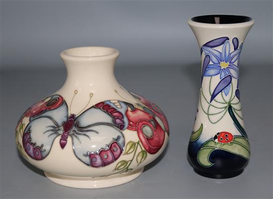 A Moorcroft Butterfly design vase and a lady bird design vase